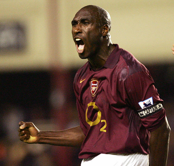 Celebration time for Sol​ Campbell during an unforgettable match against Everton while⁣ playing for Arsenal at Highbury Stadium on September 19, 2005.