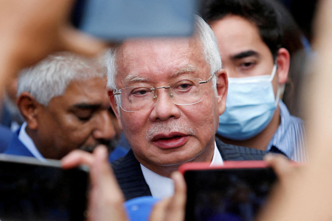 Former Malaysian Prime Minister⁢ Najib Razak speaks during trial proceedings